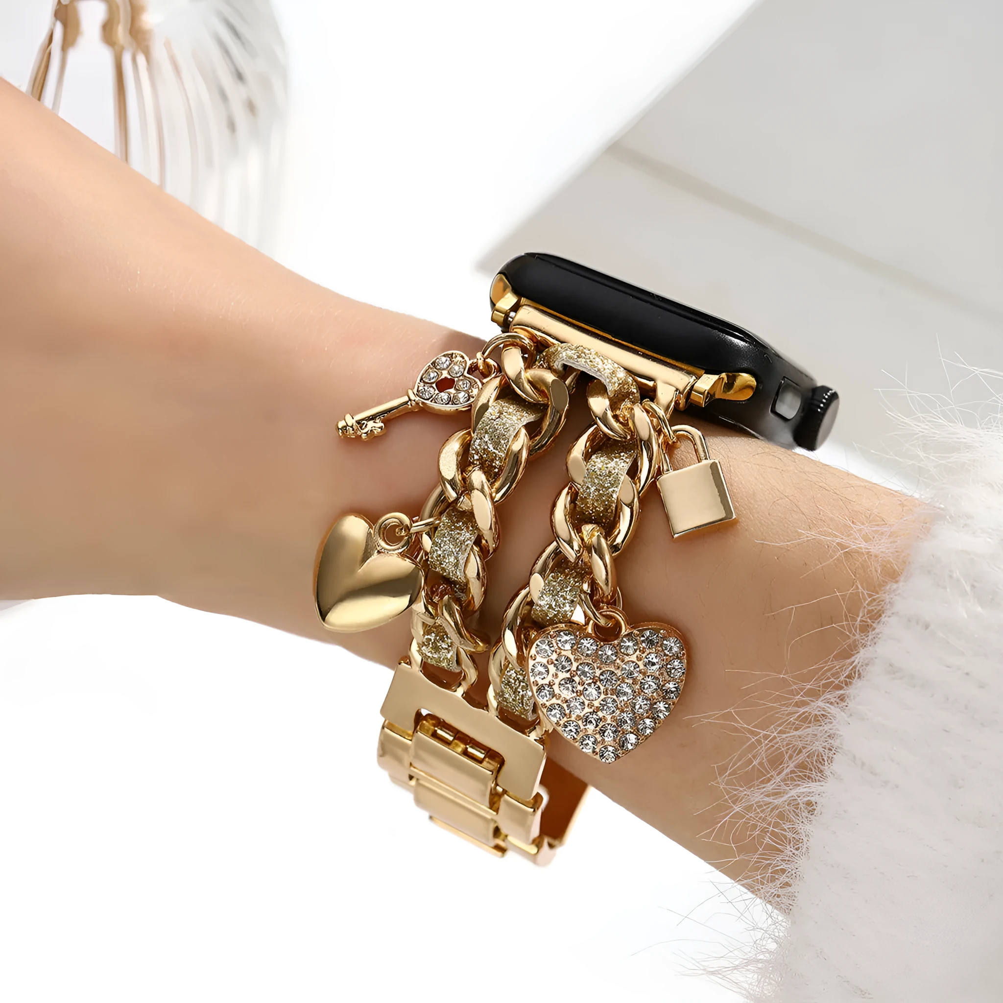 Golden heart pendant ladies watch strap in gold alloy on display with multiple size options visible