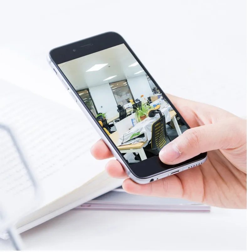 Indoor 360 degree wifi security camera with ABS housing showing rotation capability