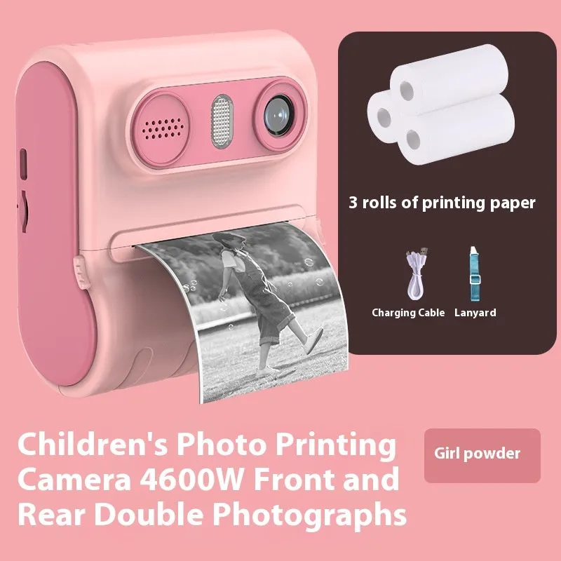 Children's instant printing camera with dual HD cameras in pink colour, showing included lanyard and printing paper