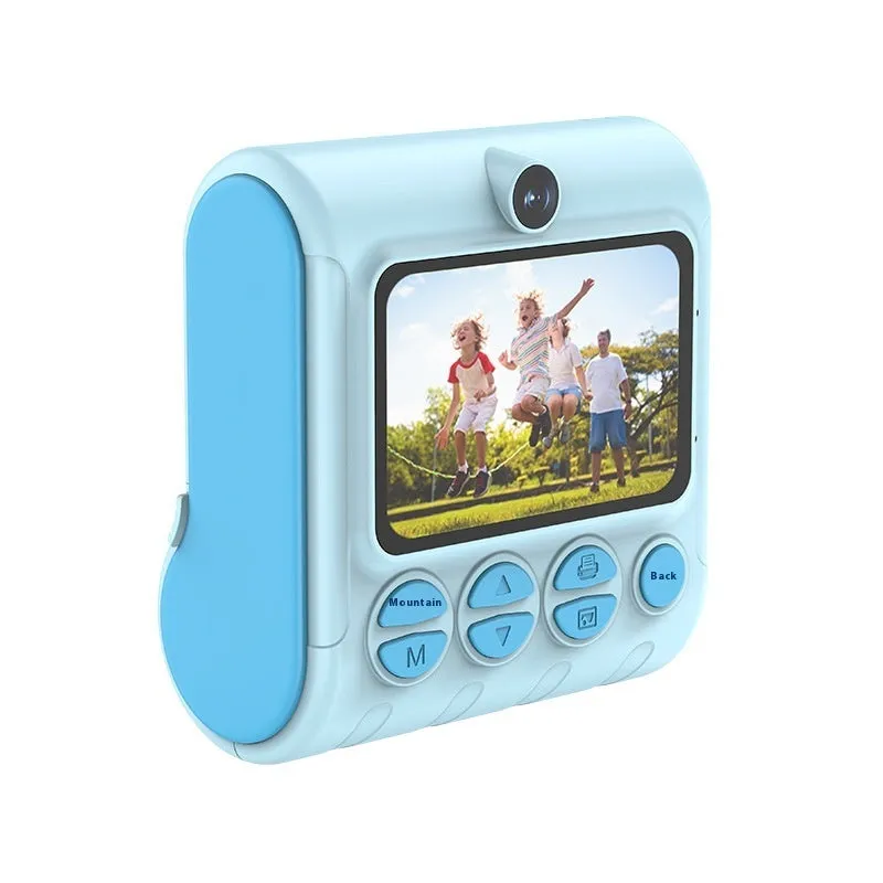 Children's instant printing camera with dual HD cameras in pink colour, showing included lanyard and printing paper