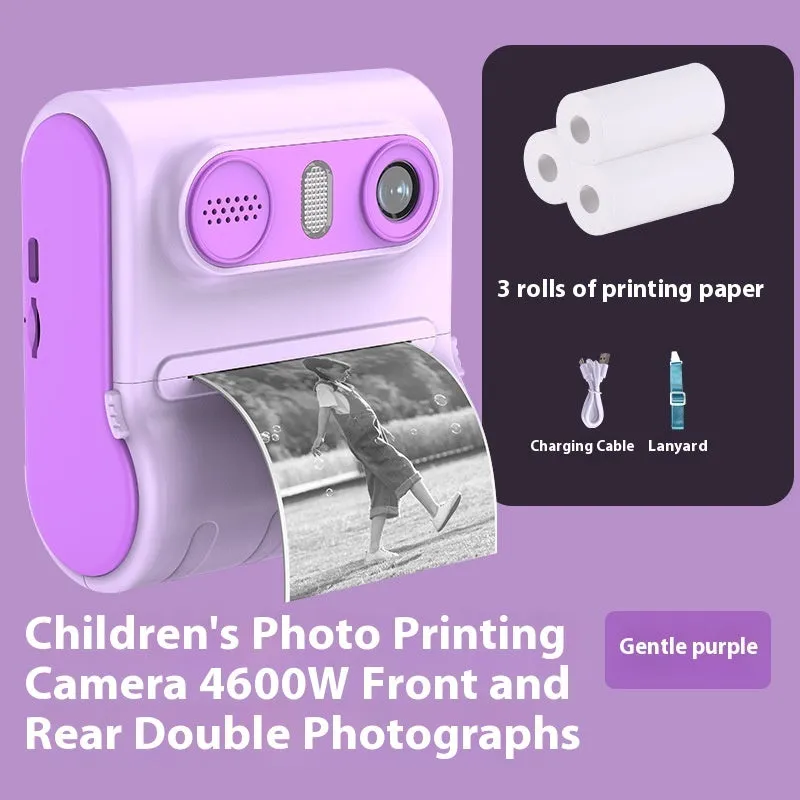 Children's instant printing camera with dual HD cameras in pink colour, showing included lanyard and printing paper