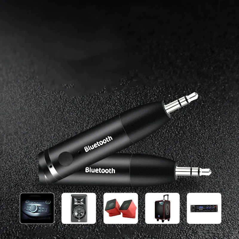 Black Bluetooth 5.0 audio receiver for car AUX or home stereo, shown with USB cable.