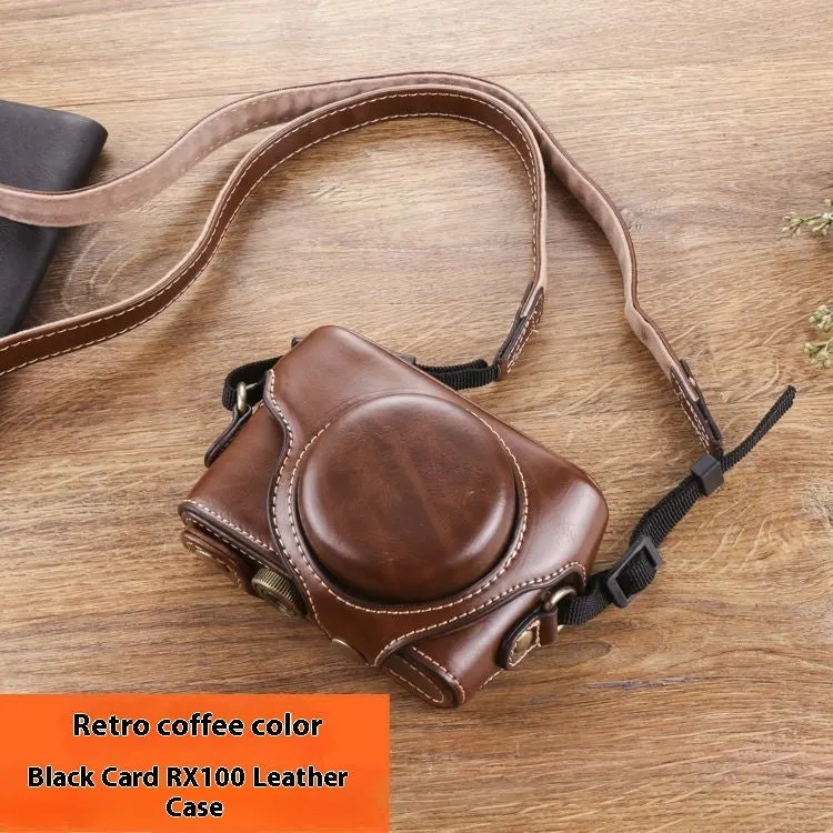 Black imitation leather portable card camera bag with crossbody strap on a solid background