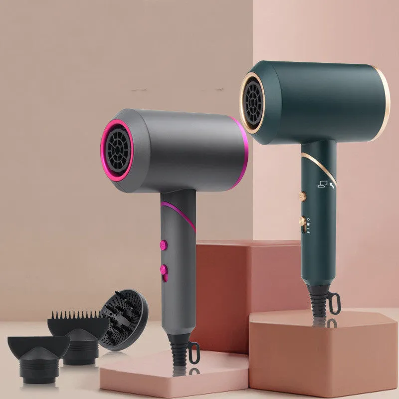 Foldable hair dryer in dark green with gold trim, showing concentrator nozzle and diffuser attachment.