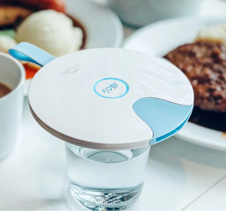 Blue USB-powered baby bottle steriliser showing slim 11.8mm profile with gravity-sensing technology