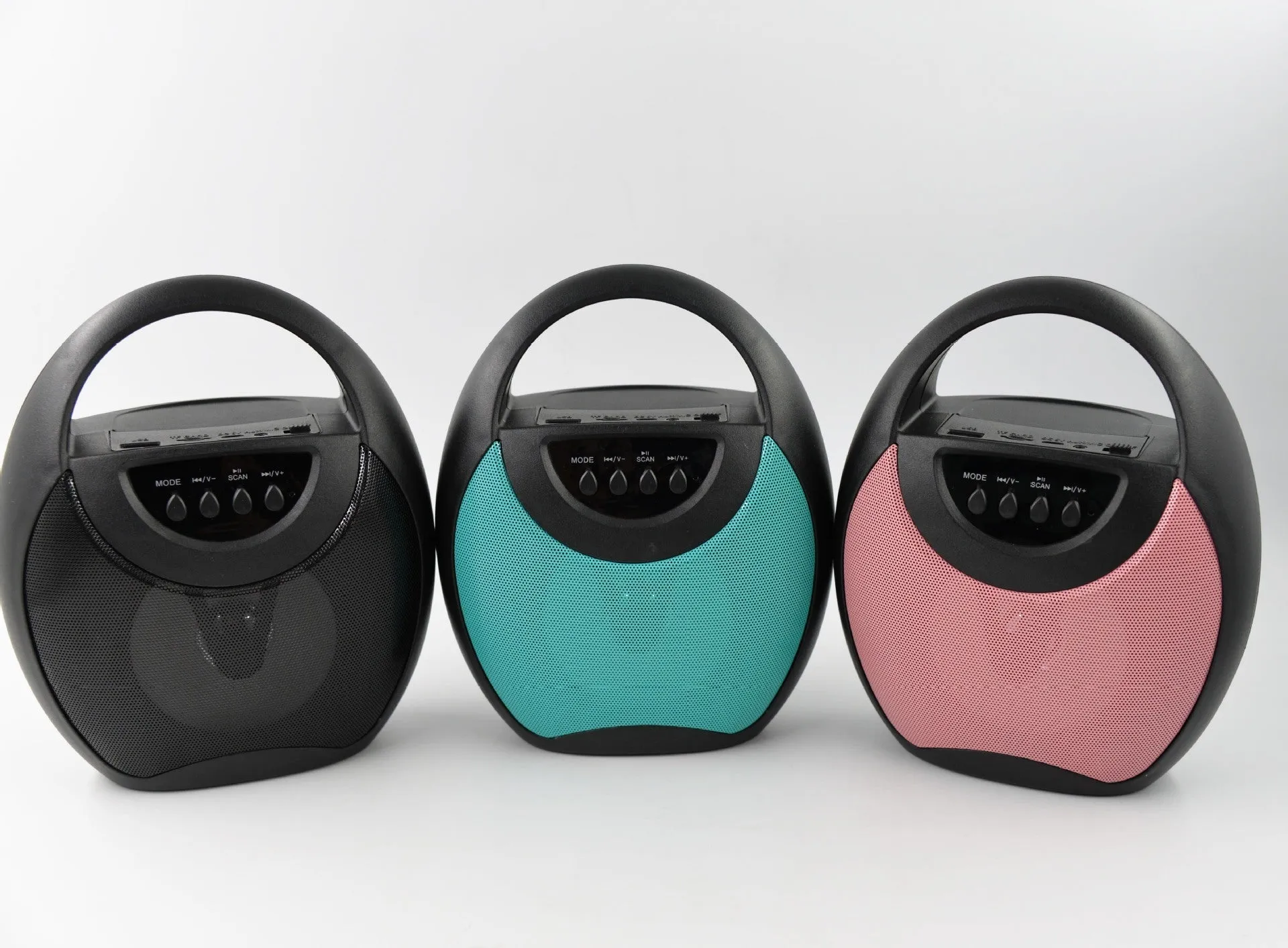 Portable Bluetooth speaker in black, blue or pink colours showing USB port for U disk or SD card playback