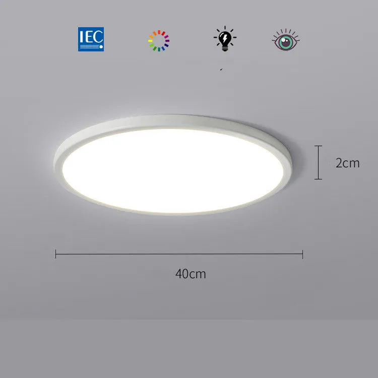 Ultra-thin round white LED ceiling lamp with aluminium frame and acrylic shade on ceiling
