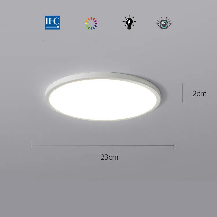 Ultra-thin round white LED ceiling lamp with aluminium frame and acrylic shade on ceiling