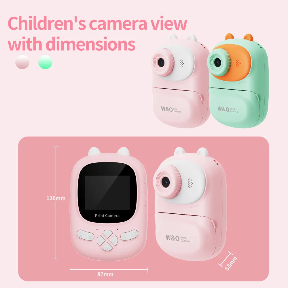 Q2 children's polaroid portable HD video digital camera in green with lanyard and stickers on white background
