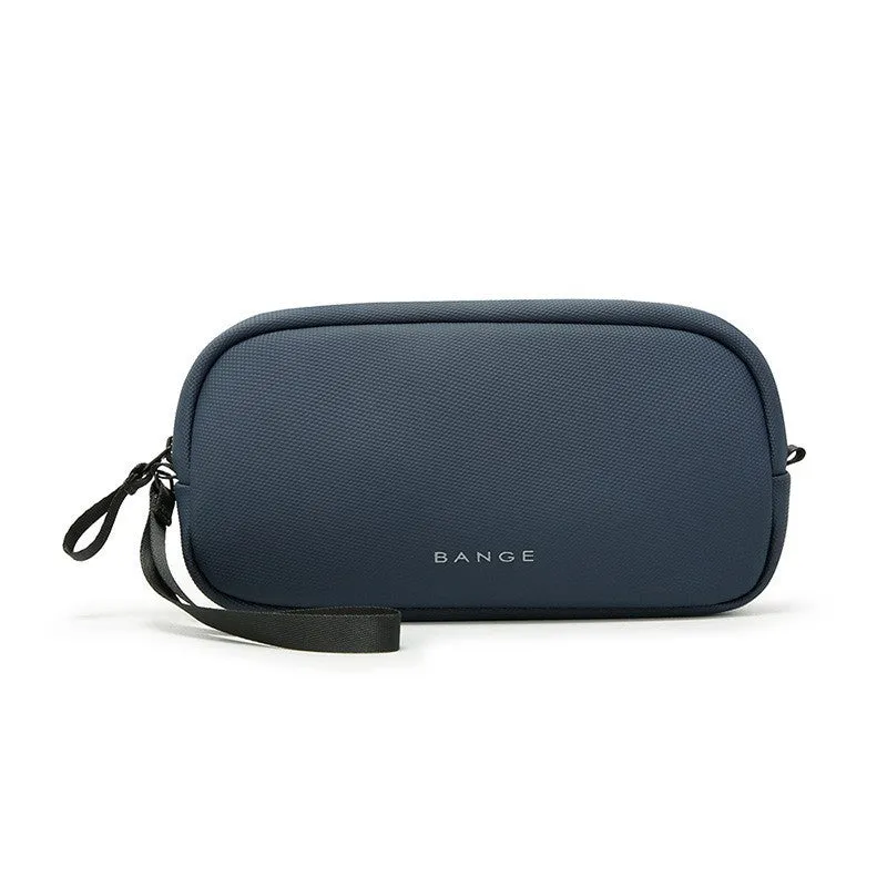 Large capacity digital accessories storage bag in black with sewing line detailing on a plain background