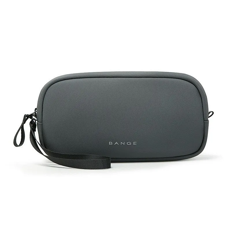 Large capacity digital accessories storage bag in black with sewing line detailing on a plain background
