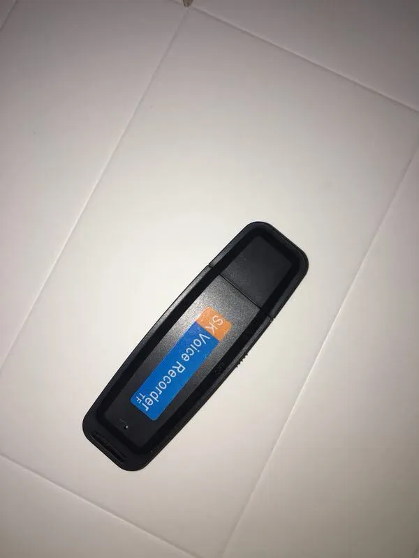 Black and white plastic USB flash drive with voice function showing dimensions and capacity options