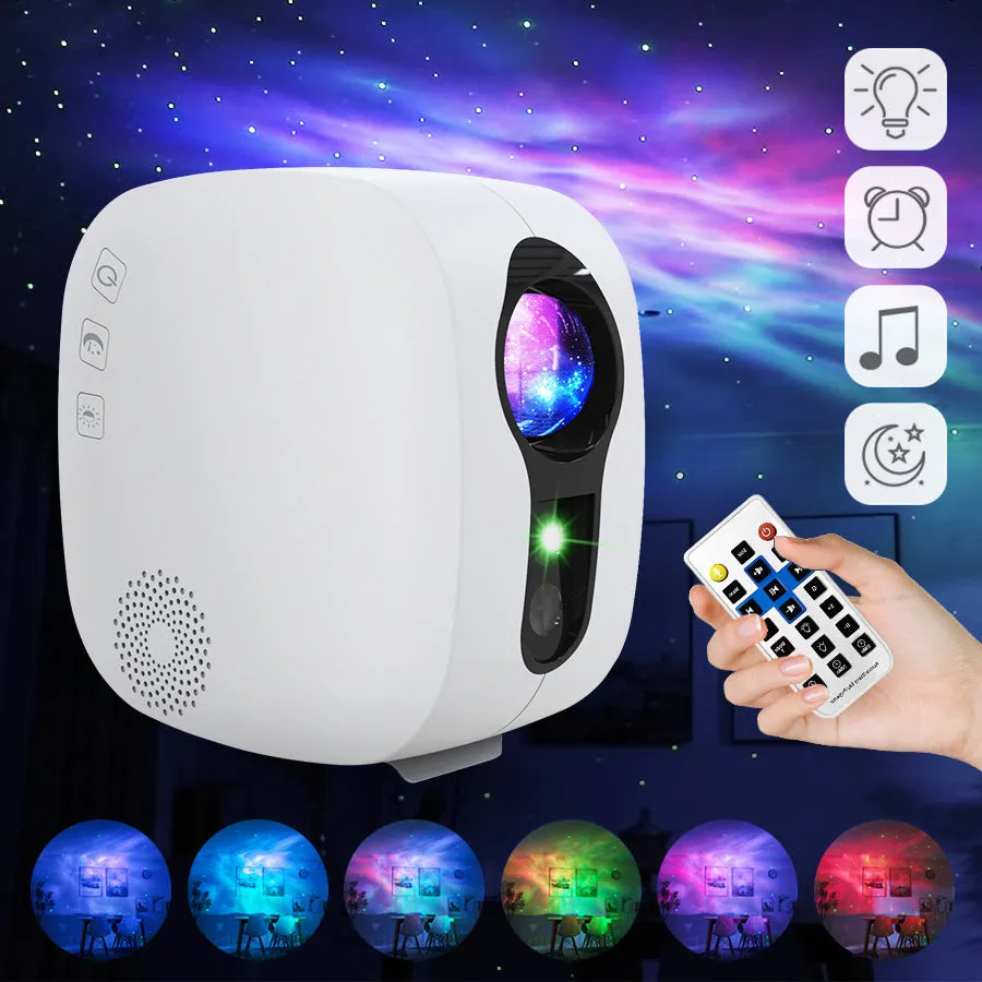 Black cube laser star projector showing nebula and moon display on a wall.