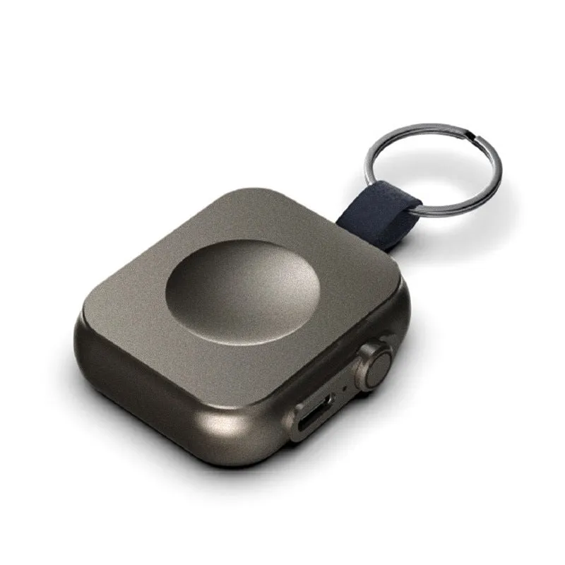 Mini magnetic wireless power supply in black, gun colour, and white with 2.5W output