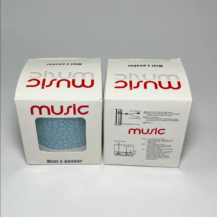 A9 Mini Cracked Bluetooth Speaker in blue with LED lights on a table