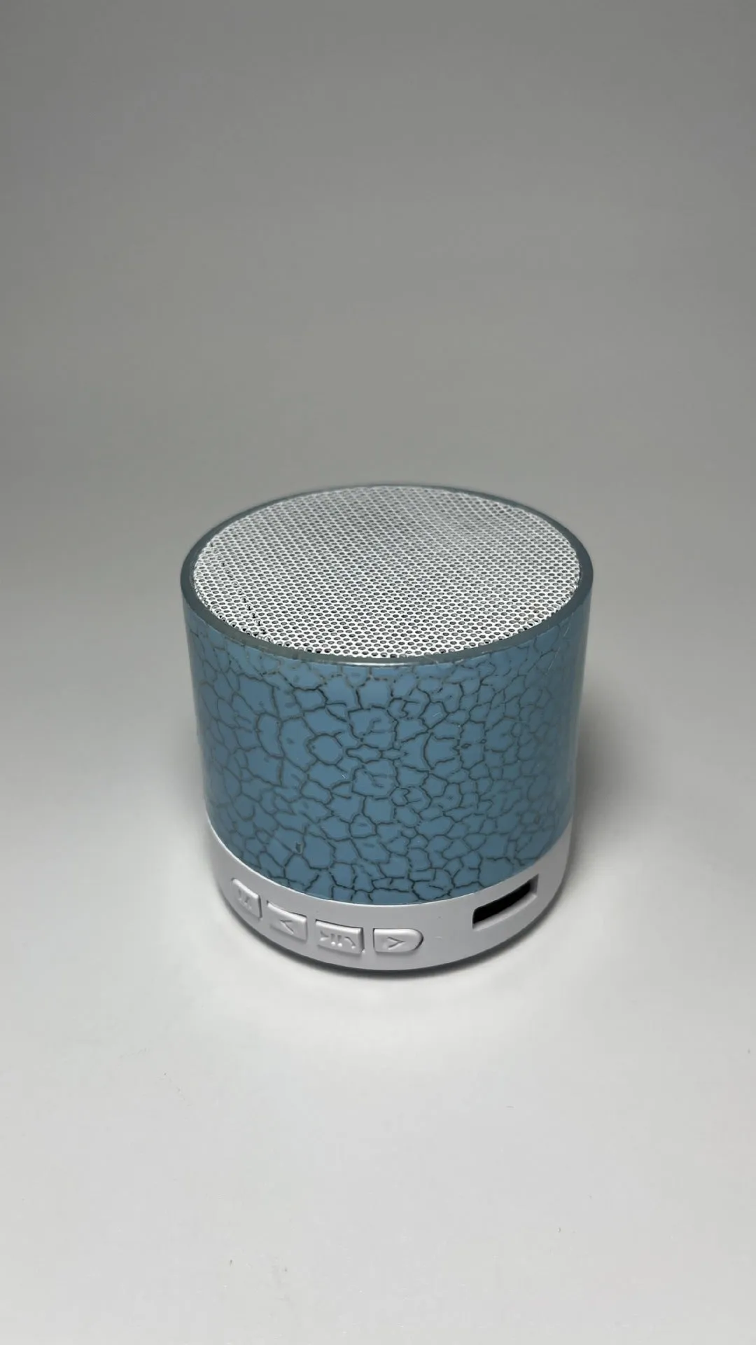 A9 Mini Cracked Bluetooth speaker in white with cracked-effect finish and LED lights