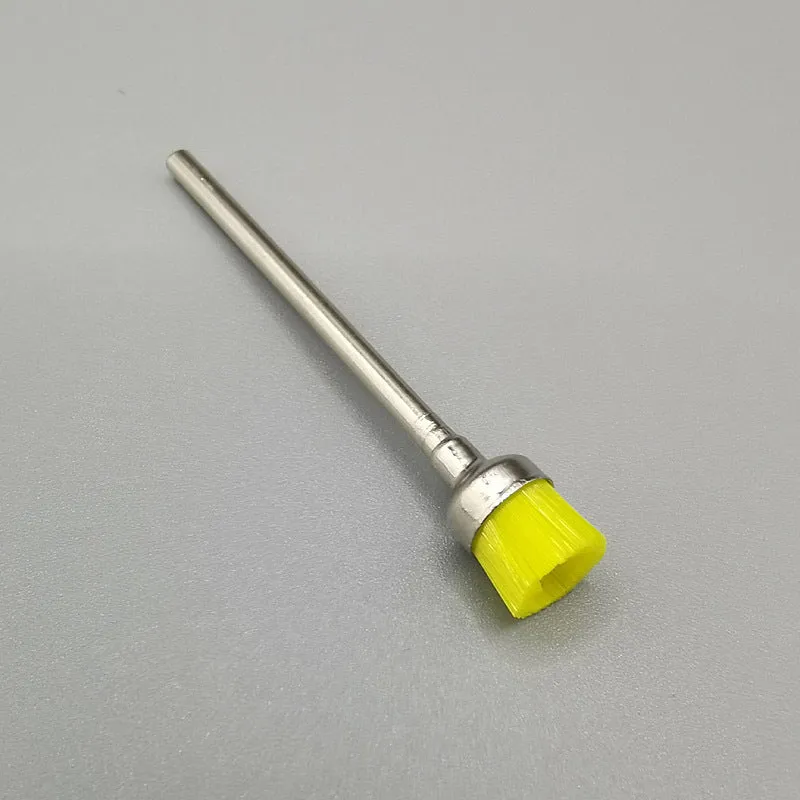 Polishing brush for cleaning nail grinding heads, available in multiple colours, with a simple handheld design.