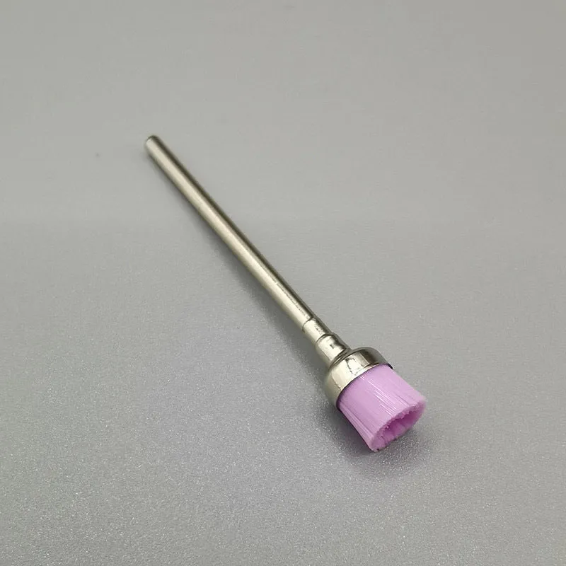Polishing brush for cleaning nail grinding heads, available in multiple colours, with a simple handheld design.