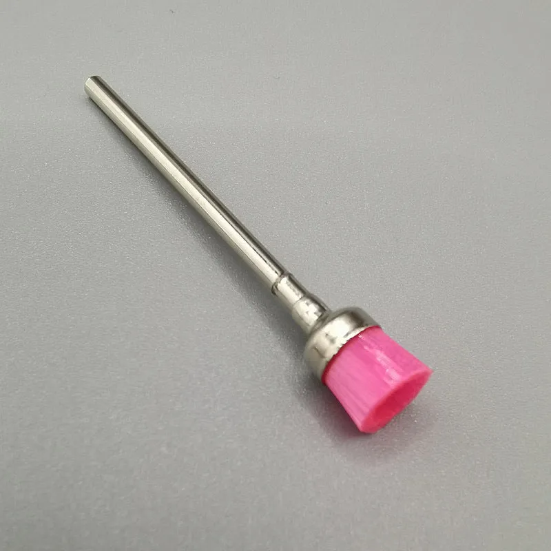 Polishing brush for cleaning nail grinding heads, available in multiple colours, with a simple handheld design.