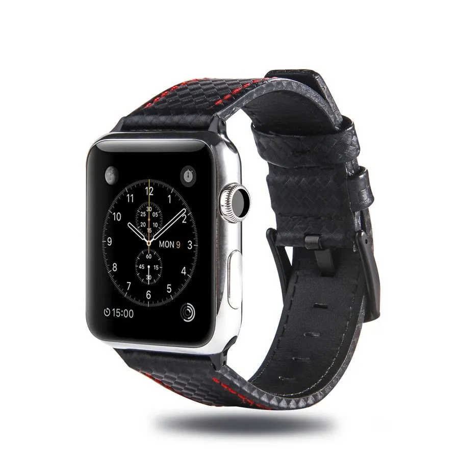Leather and carbon fibre Apple Watch strap with red stitching next to a black PC case with carbon fibre pattern.