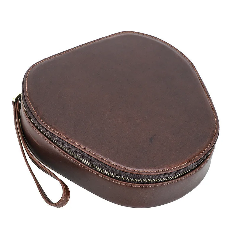 Brown genuine leather storage bag for Apple AirPods Max with lanyard on white background