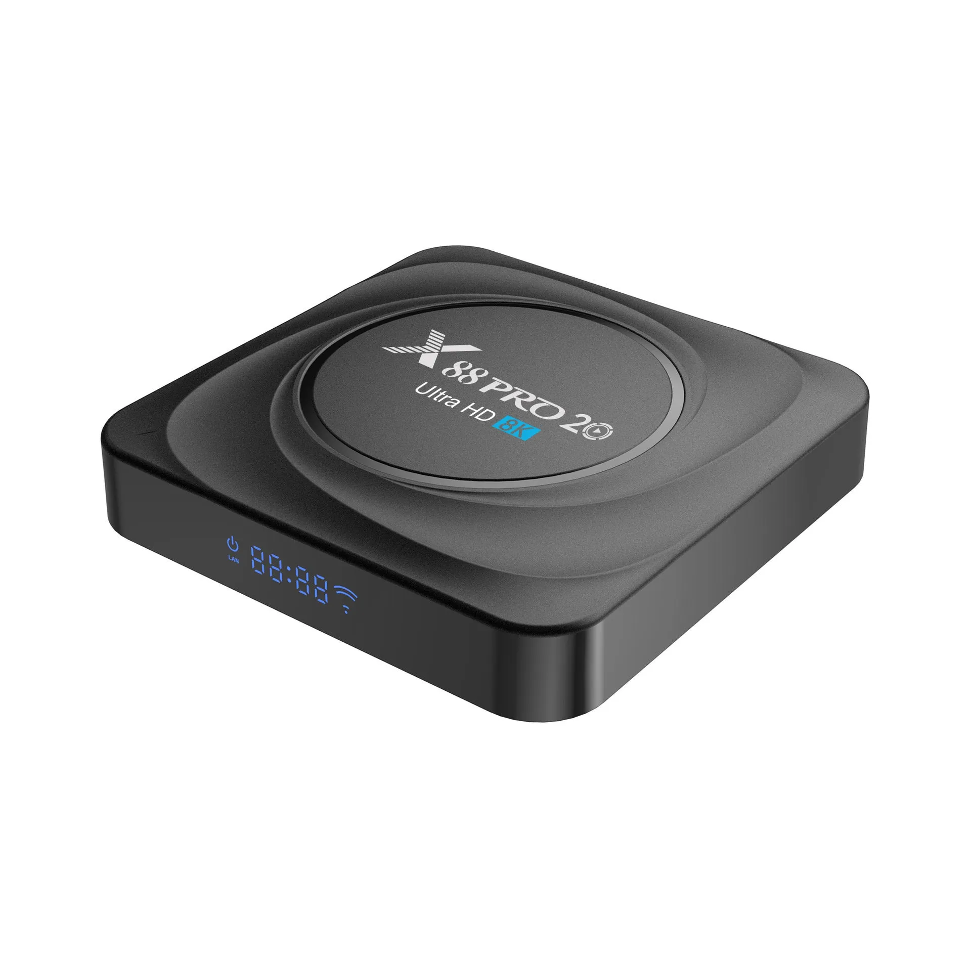 Android 11.0 set-top TV box with remote control and cables on a wooden table.