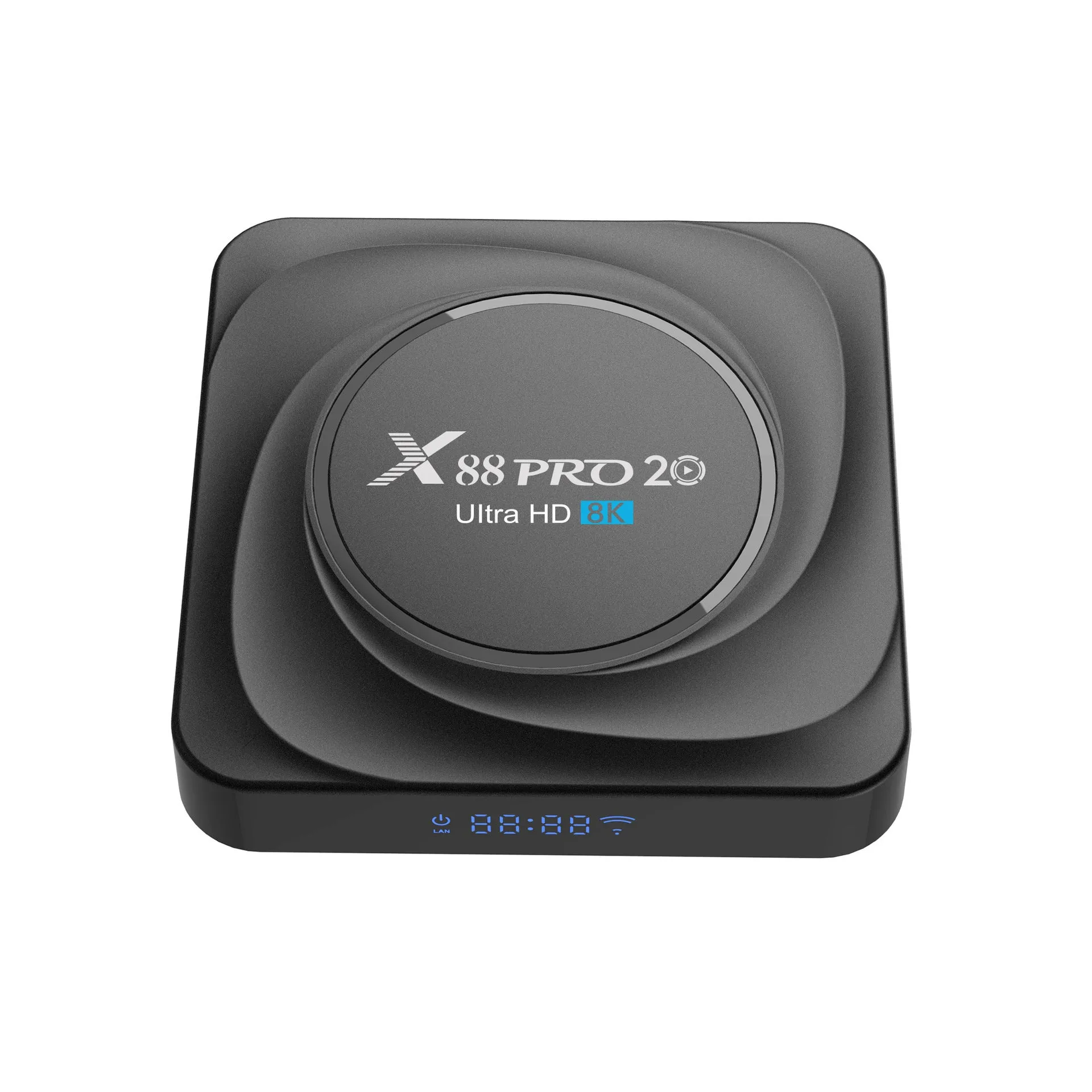 Android 11.0 set-top TV box with remote control and cables on a wooden table.