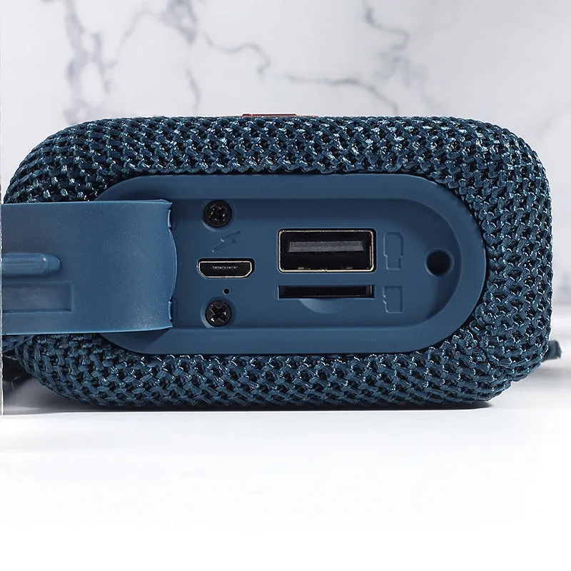 Wireless Bluetooth speaker in black, front view showing control buttons and grille, with double diaphragm subwoofer, 100x40x78mm