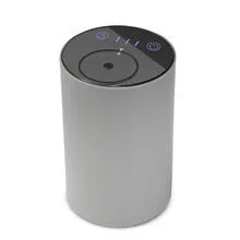 Black rechargeable car air freshener diffuser with automatic mist spray in vehicle cup holder