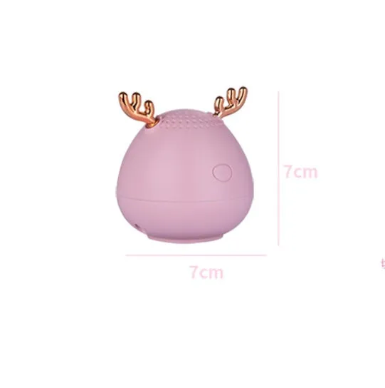 Compact Bluetooth wireless speaker with USB port, available in green, pink or white colours