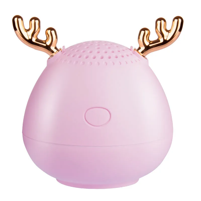 Compact Bluetooth wireless speaker with USB port, available in green, pink or white colours