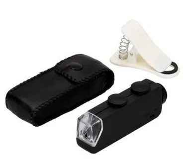Clip-on smartphone microscope with 60-100X zoom, LED and UV light, attached to a phone camera