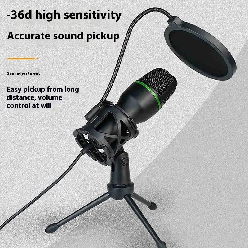 Black USB condenser microphone on tripod stand with anti-spray net for home computer writing