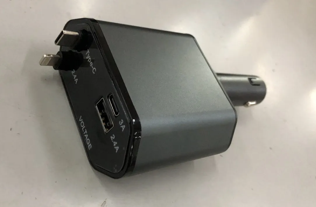 Automatic retractable 120W car charger with one-to-four USB ports and cigarette lighter plug.