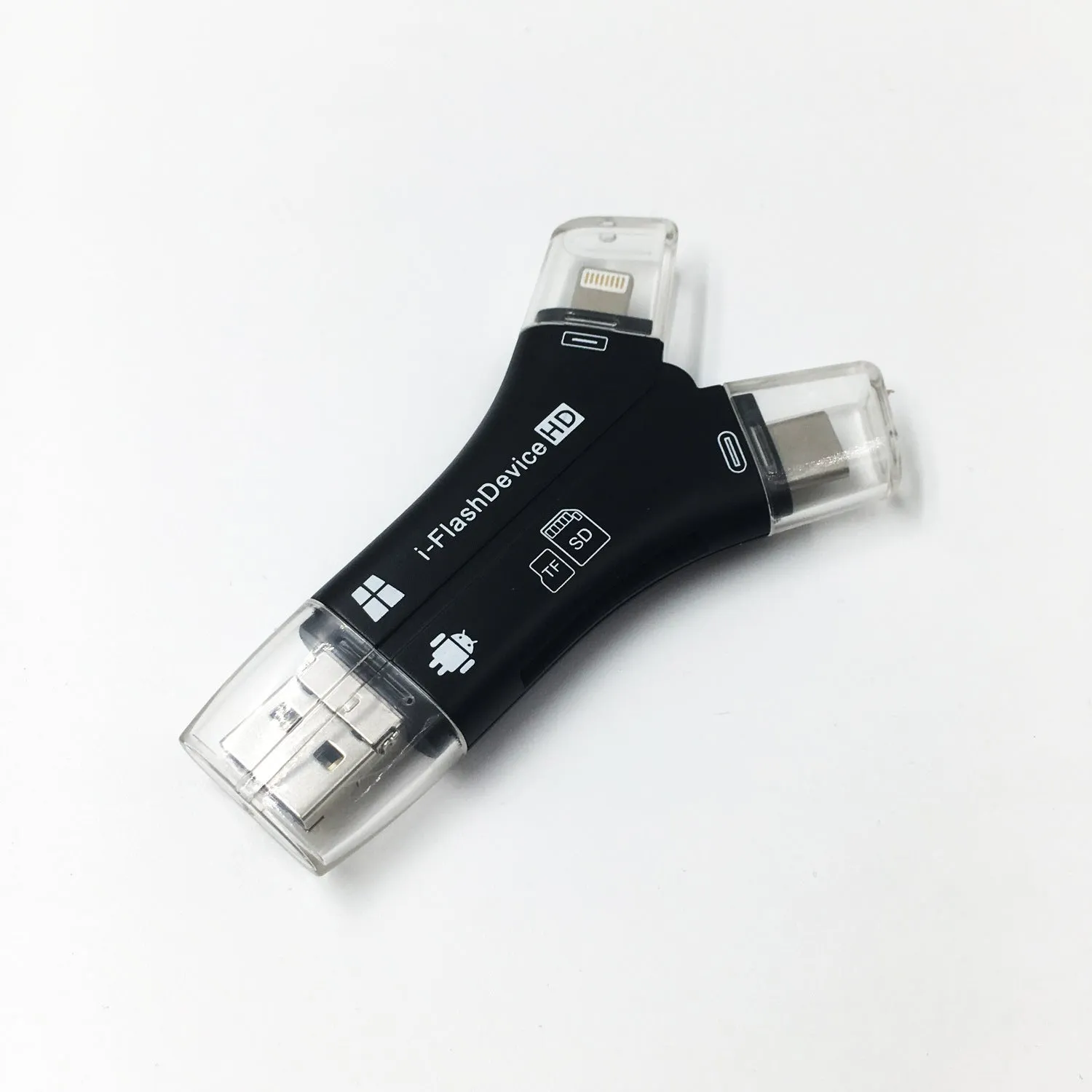 White NK908 4-in-1 SD card reader with Lightning, USB-C, Micro USB and USB ports on a wooden table.
