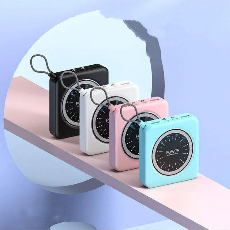 Mini clock power bank in alloy case with multiple USB ports, shown in pink, black, green, and white colour options.