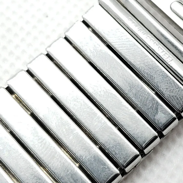 Silver stainless steel elastic Apple Watch band on a wrist, compatible with 38mm to 44mm cases