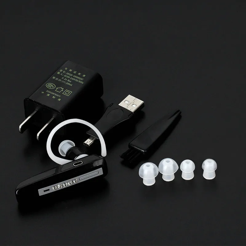 Black wireless invisible hearing aid with silicone shell and USB charging cable