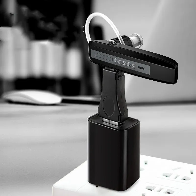 Black wireless invisible hearing aid with silicone shell and USB charging cable