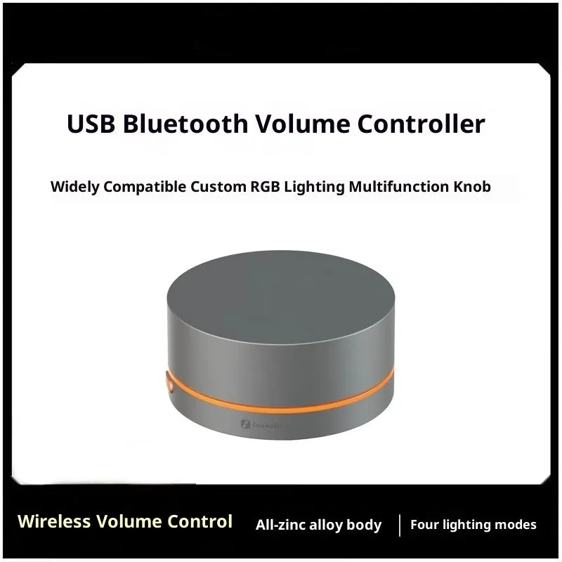 Black VOL20 USB volume controller on desk with rotary knob and cable