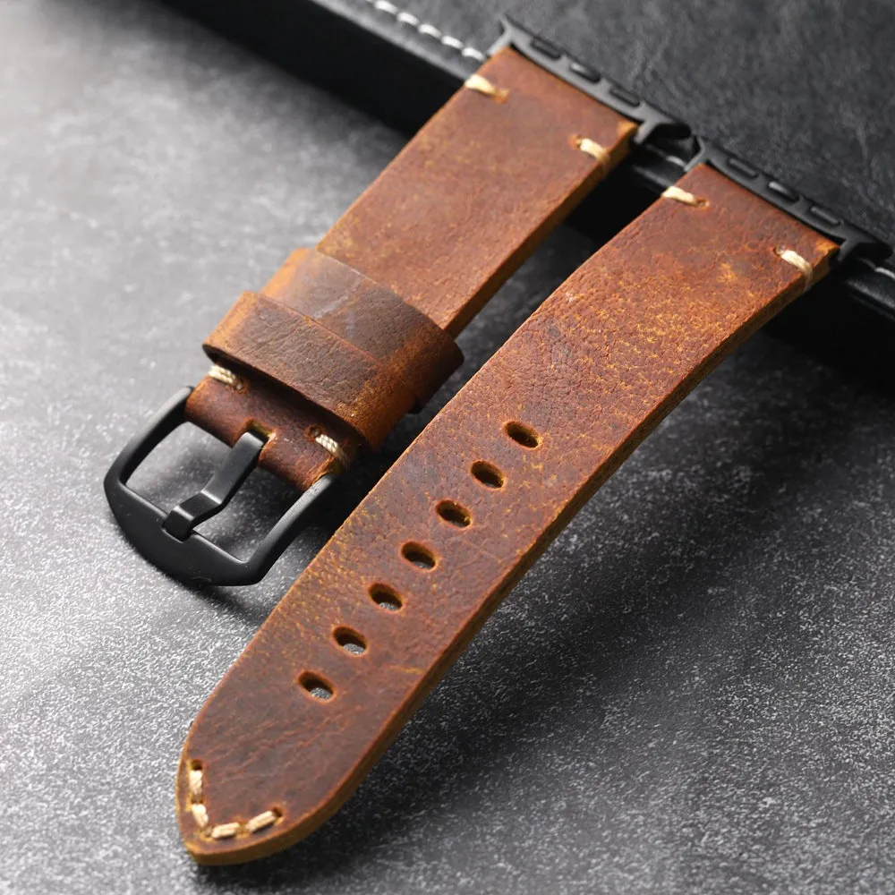 Brown handmade top layer cowhide watch strap with stainless steel buckle on a watch