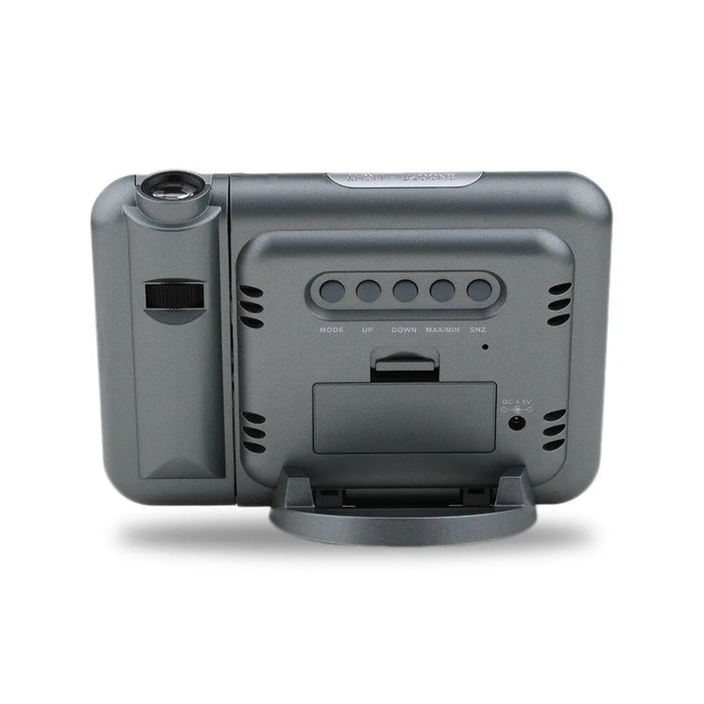 Black digital projection alarm clock showing time, temperature, and humidity on its display.