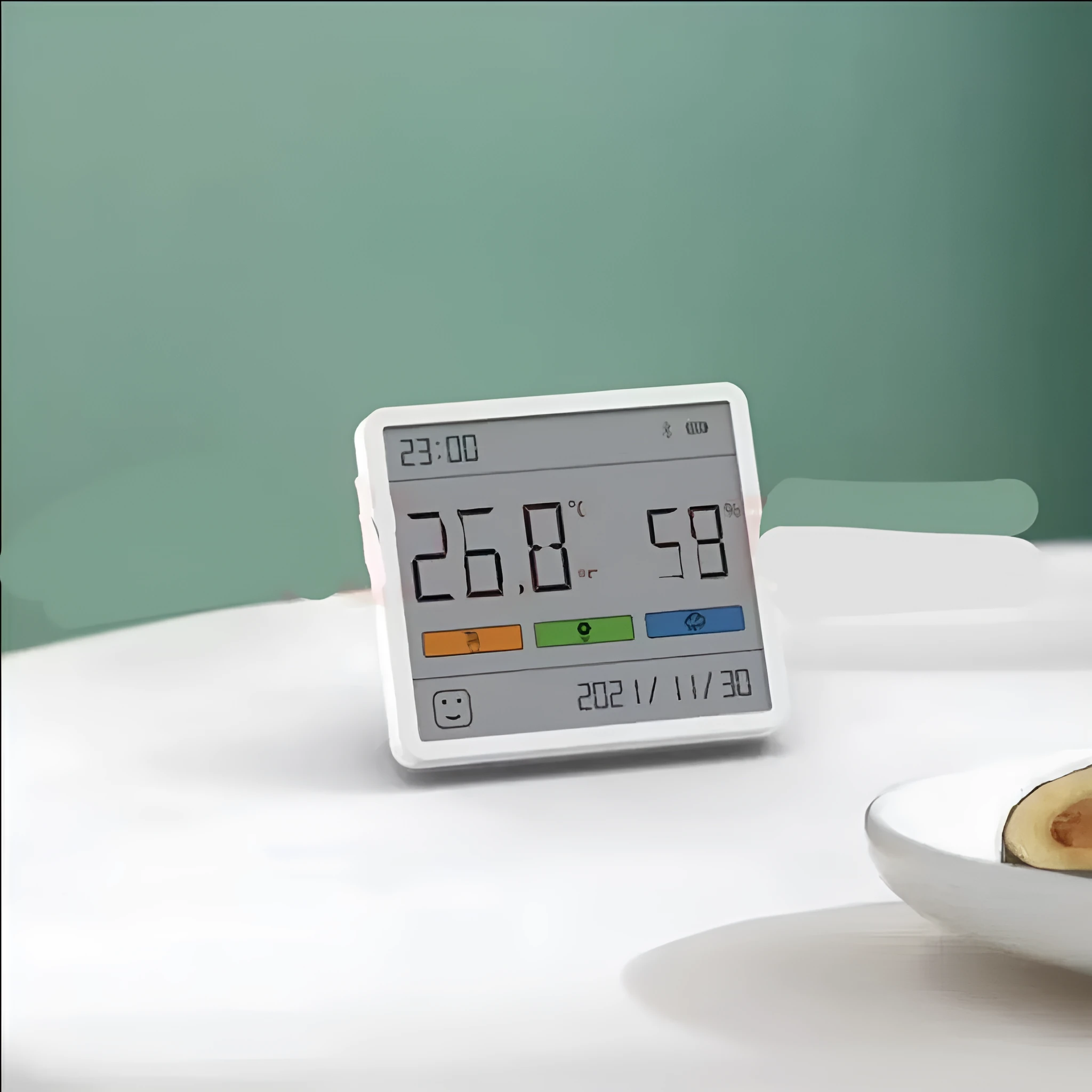 Mini digital clock hygrometer with ABS body and PMMA screen, showing temperature and humidity on a white background