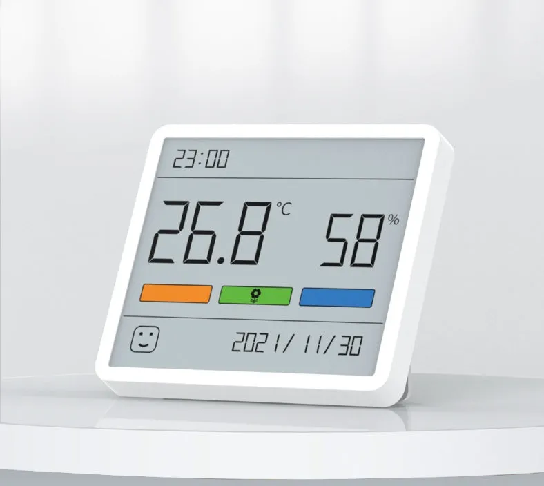 Mini digital clock hygrometer with ABS body and PMMA screen, showing temperature and humidity on a white background