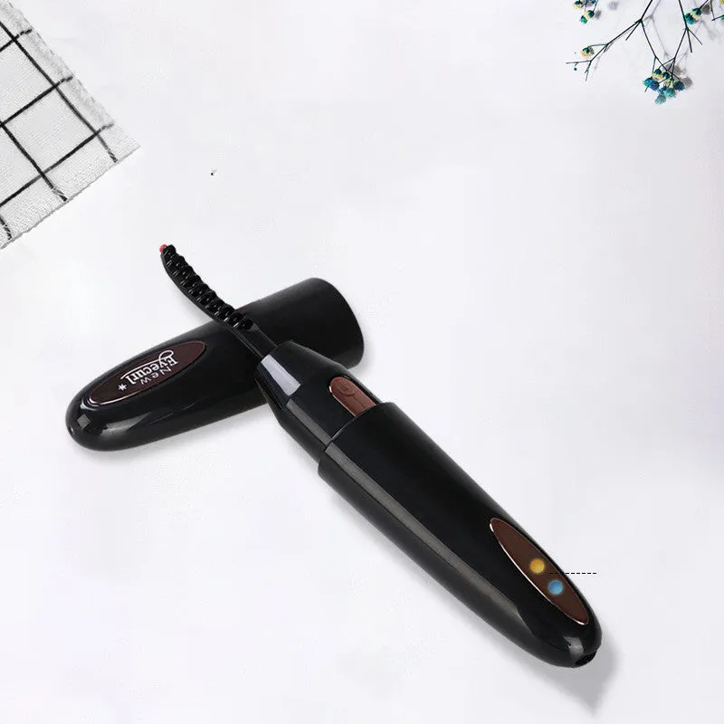 Electric rechargeable eyelash curler in black with silicone pad and temperature button