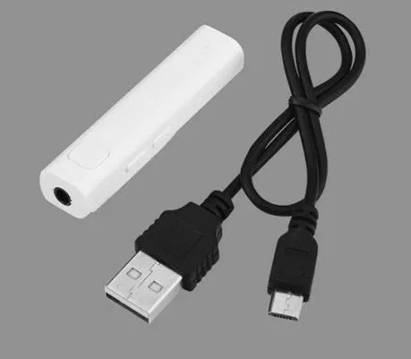 Mini Bluetooth real time voice translator for 26 languages, black device on white background