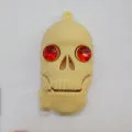 Halloween skeleton skull shaped USB flash drive on a keychain, showing PVC shell in a selected style.