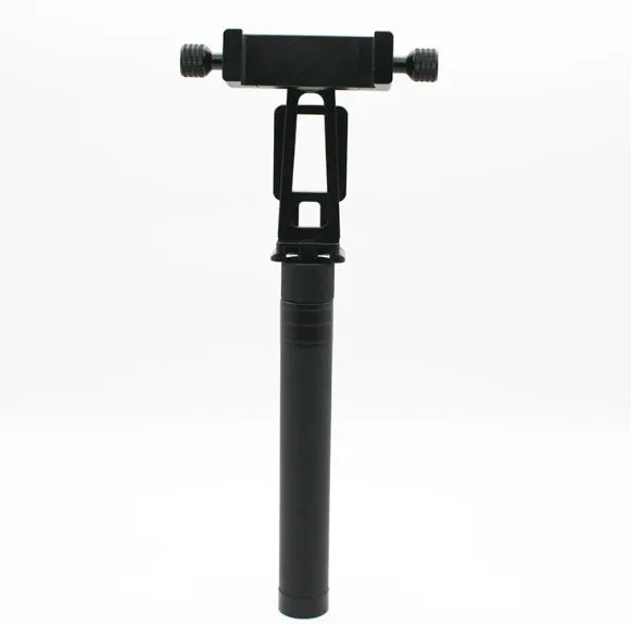 Black retractable aluminium selfie stick with phone clamp, extended to full length.