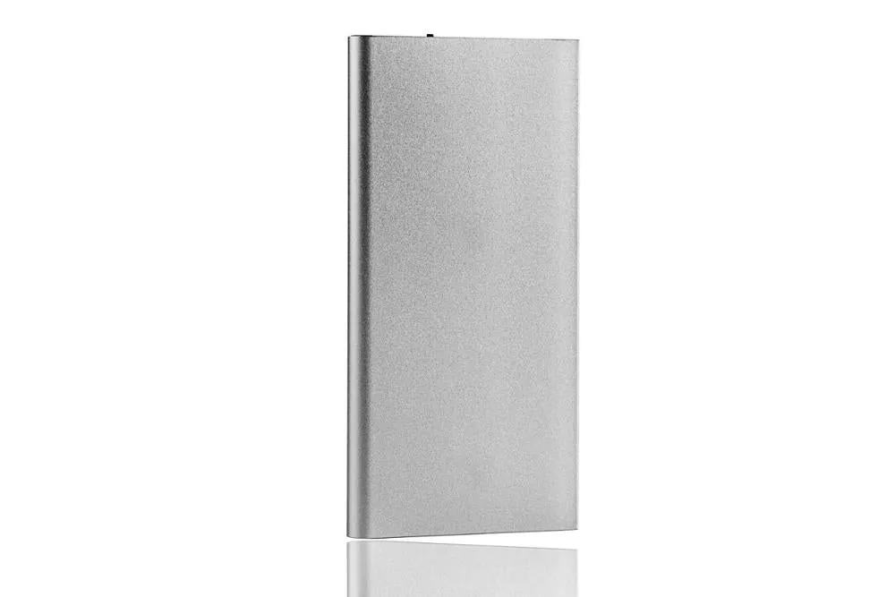 Grey power bank with multi-interface ports and alloy shell on white background