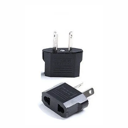Compact black three-outlet travel plug converter adapter with AU plug type on a white background